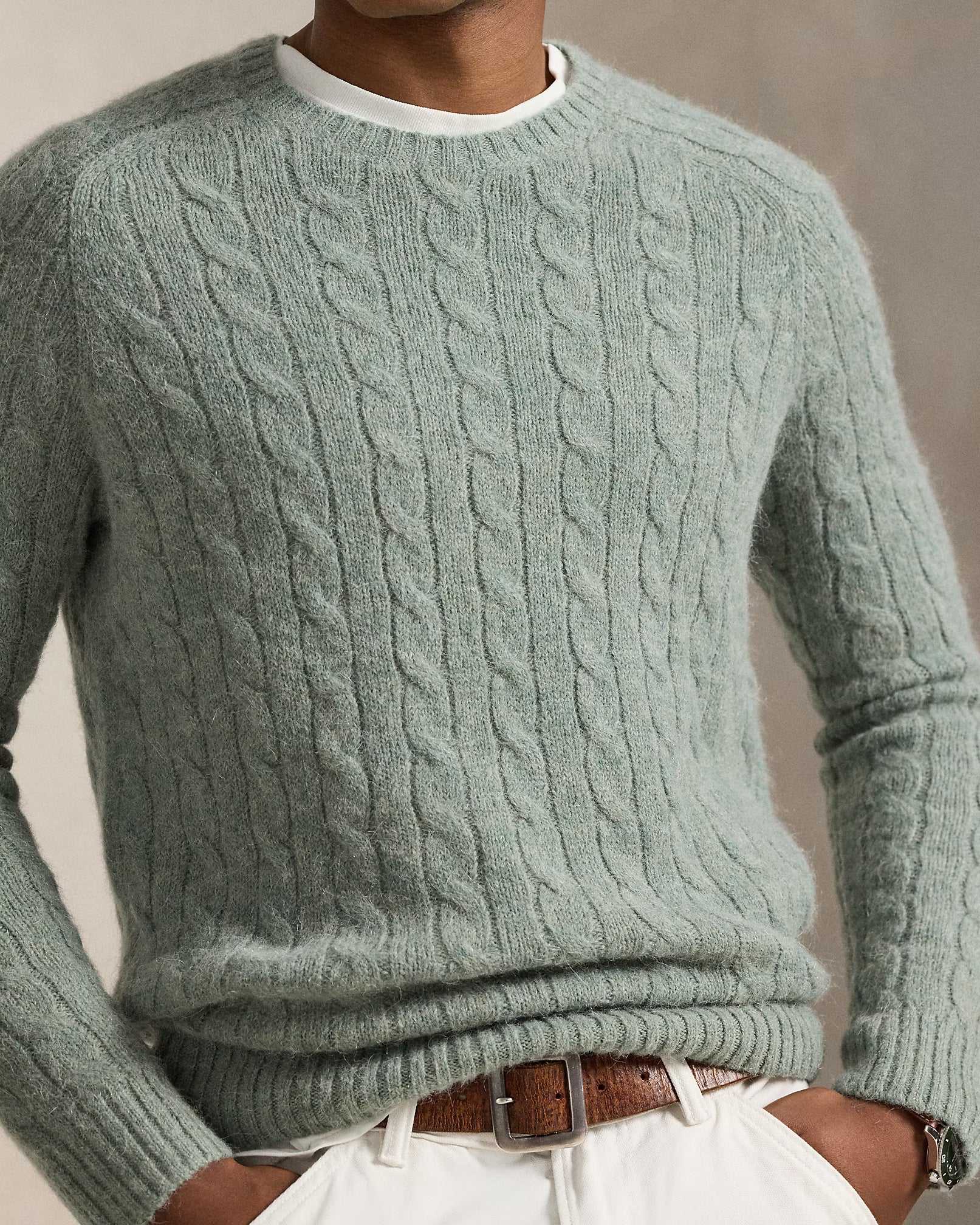 Pull torsadé à renforts en daim