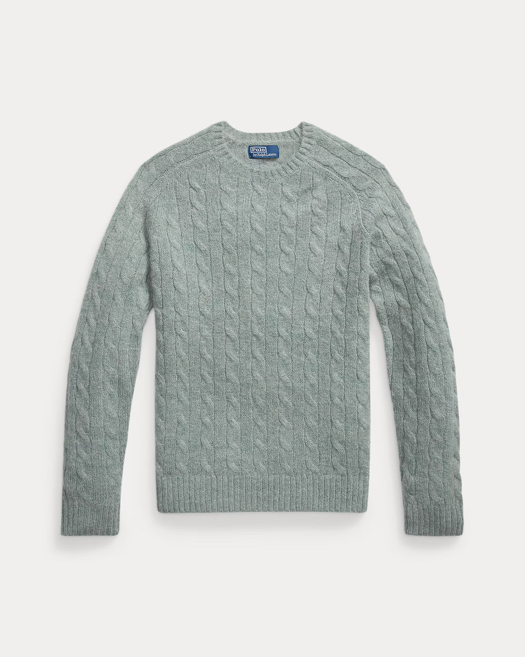Pull torsadé à renforts en daim